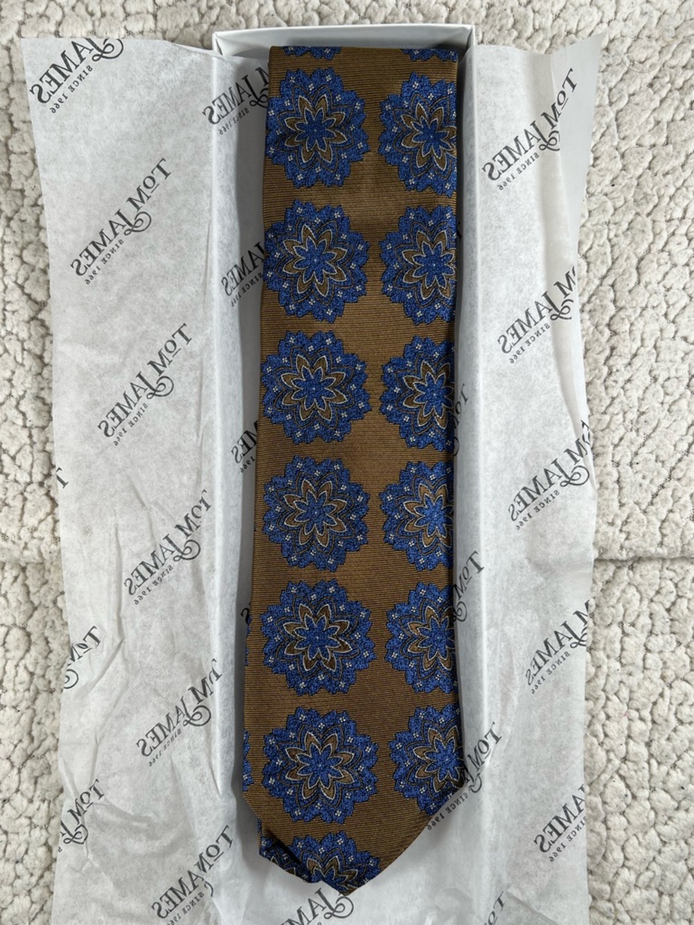 Tom James Brown Tie with Blue Floral Medallion - 100% Silk